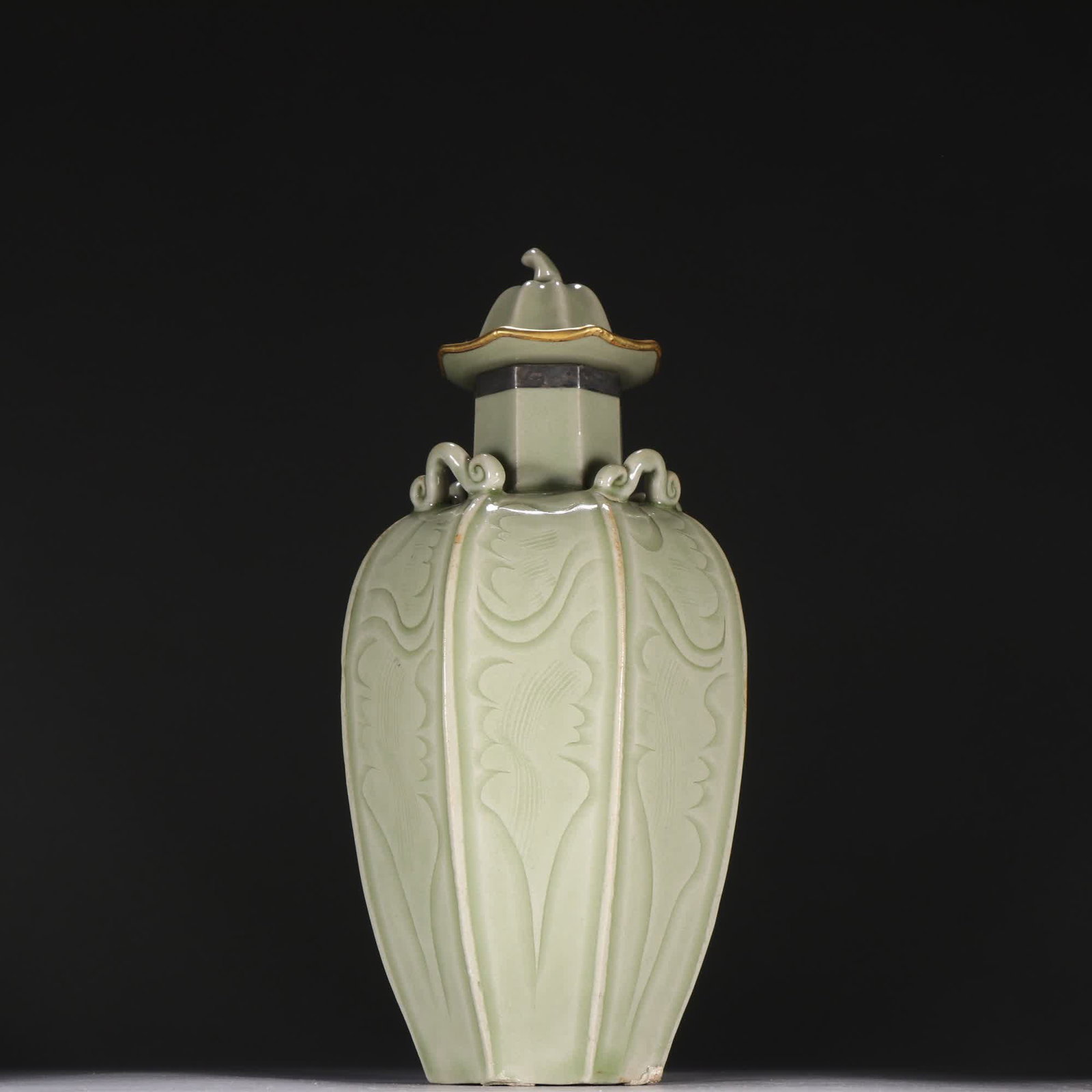 A Song Yue kiln eight-way lid bottle (1 of 9)