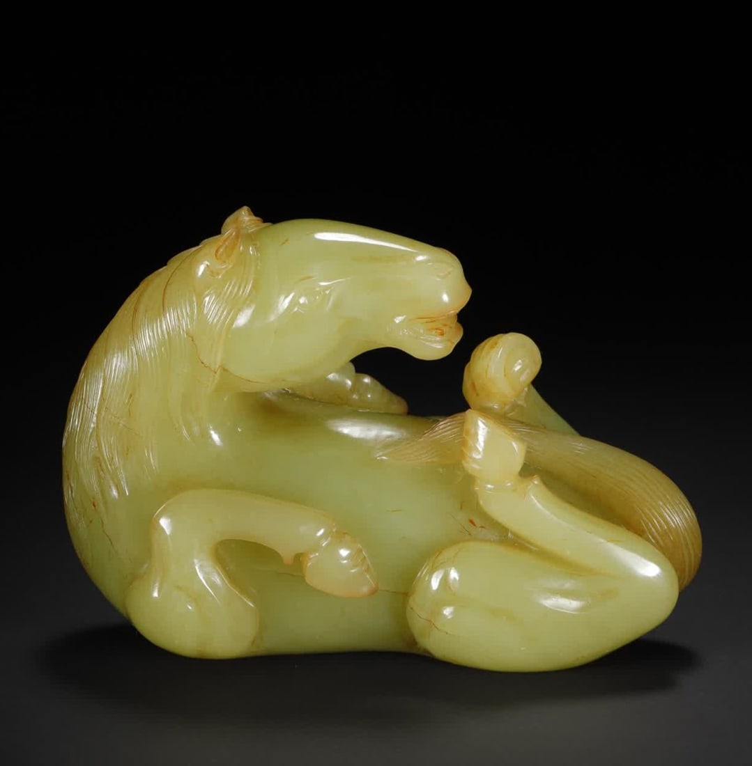A Qing Dynasty Hetian topaz rolling horse ornament: Qing Dynasty Hetian topaz rolling horse ornament SIZE: 9.8x4.2x7.3cm W:350g (The Dimensions Of All Batches Are Manually Measured.If You Need More Detailed Information, Please Contact Our Customer Serv