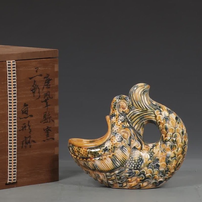 A three-colored fish-shaped cup in Tanggong County kiln: Tang Gong County kiln three-colored fish-shaped cup SIZE: H:12.5cm MouthD:4.5cm D:14cm (The Dimensions Of All Batches Are Manually Measured.If You Need More Detailed Information, Please Contact Our