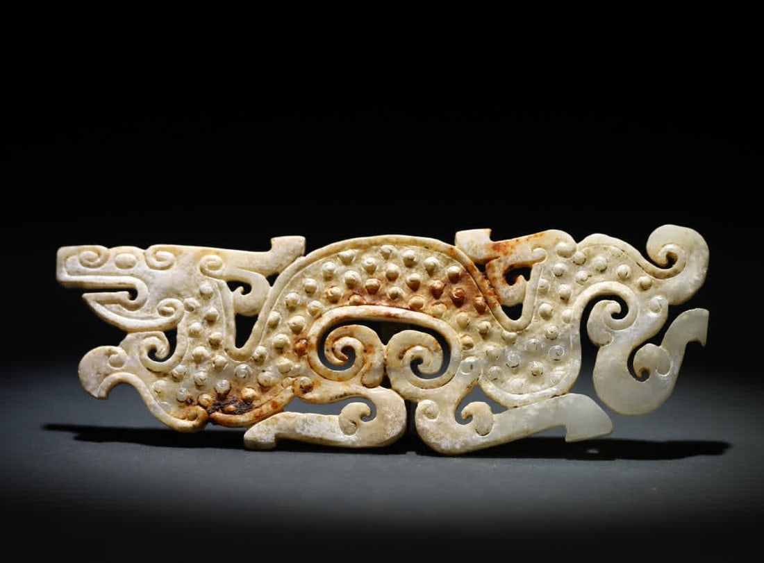 A Han Dynasty jade dragon pattern carving: Han Dynasty jade dragon pattern carving SIZE: H: Ancient jade dragon pattern carving 13.6x4.9x0.9cm W: 55.6g (The Dimensions Of All Batches Are Manually Measured.If You Need More Detailed Information,