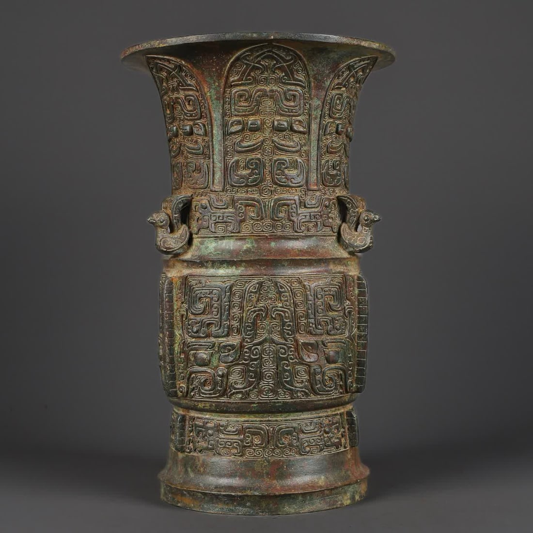A Western Zhou bronze beast face three bird round statue (1 of 9)