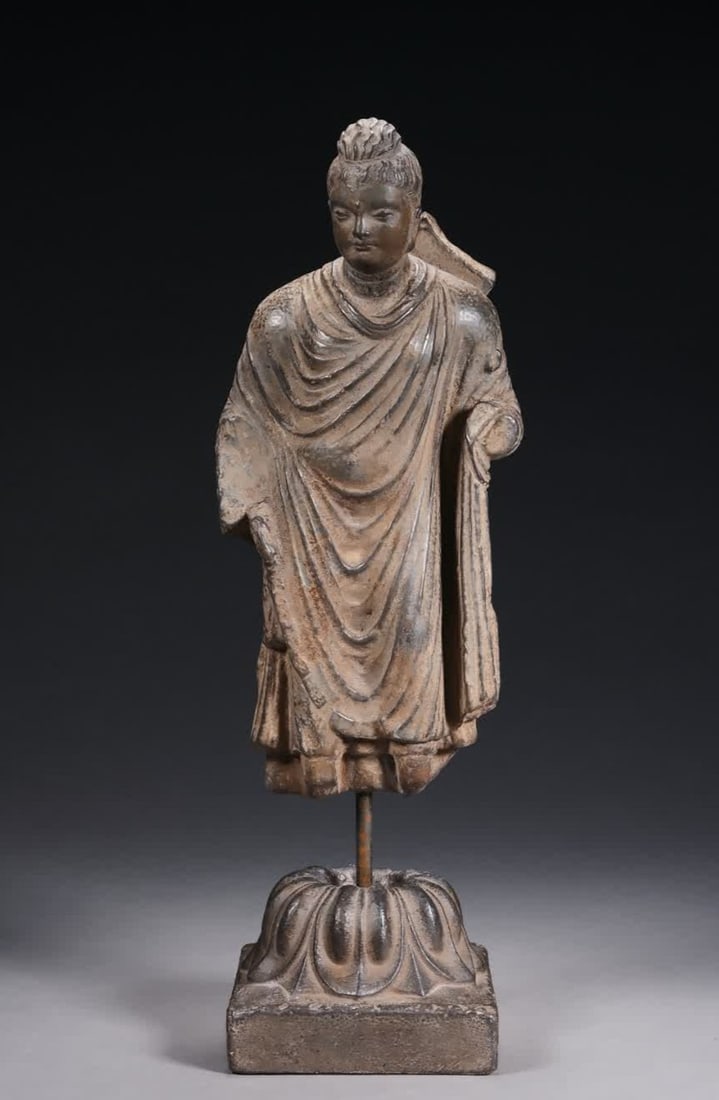A stone carved statue of Kendra Buddha: Stone carving of Kendra Buddha SIZE: Total H: 33cm Buddha H: 24cm W: 11cm (The Dimensions Of All Batches Are Manually Measured.If You Need More Detailed Information, Please Contact Our Customer Servic