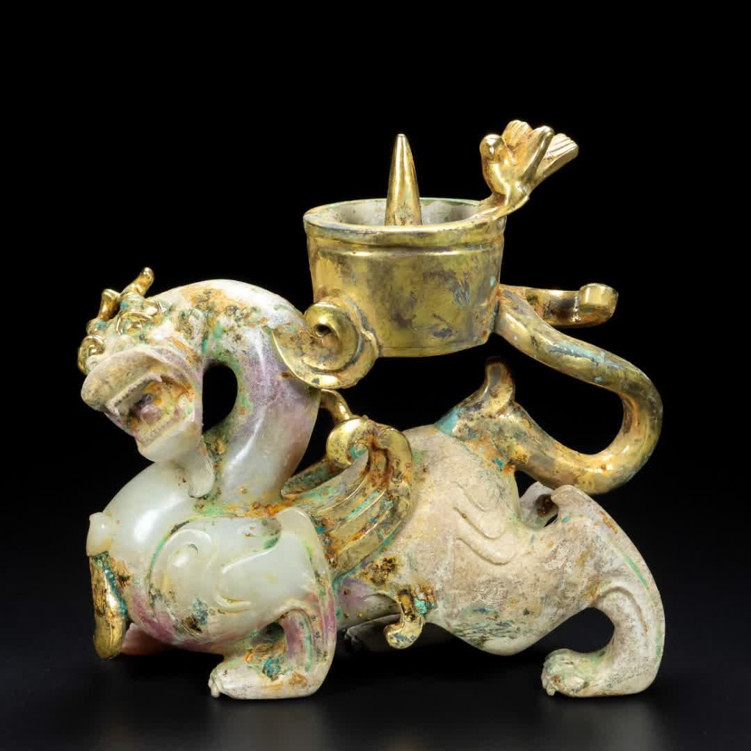 A Han Dynasty jade candlestick: Han Dynasty jade candlestick SIZE: L: 14cm W: 5cm H: 13.5cm Total W: 741g (The Dimensions Of All Batches Are Manually Measured.If You Need More Detailed Information, Please Contact Our Customer