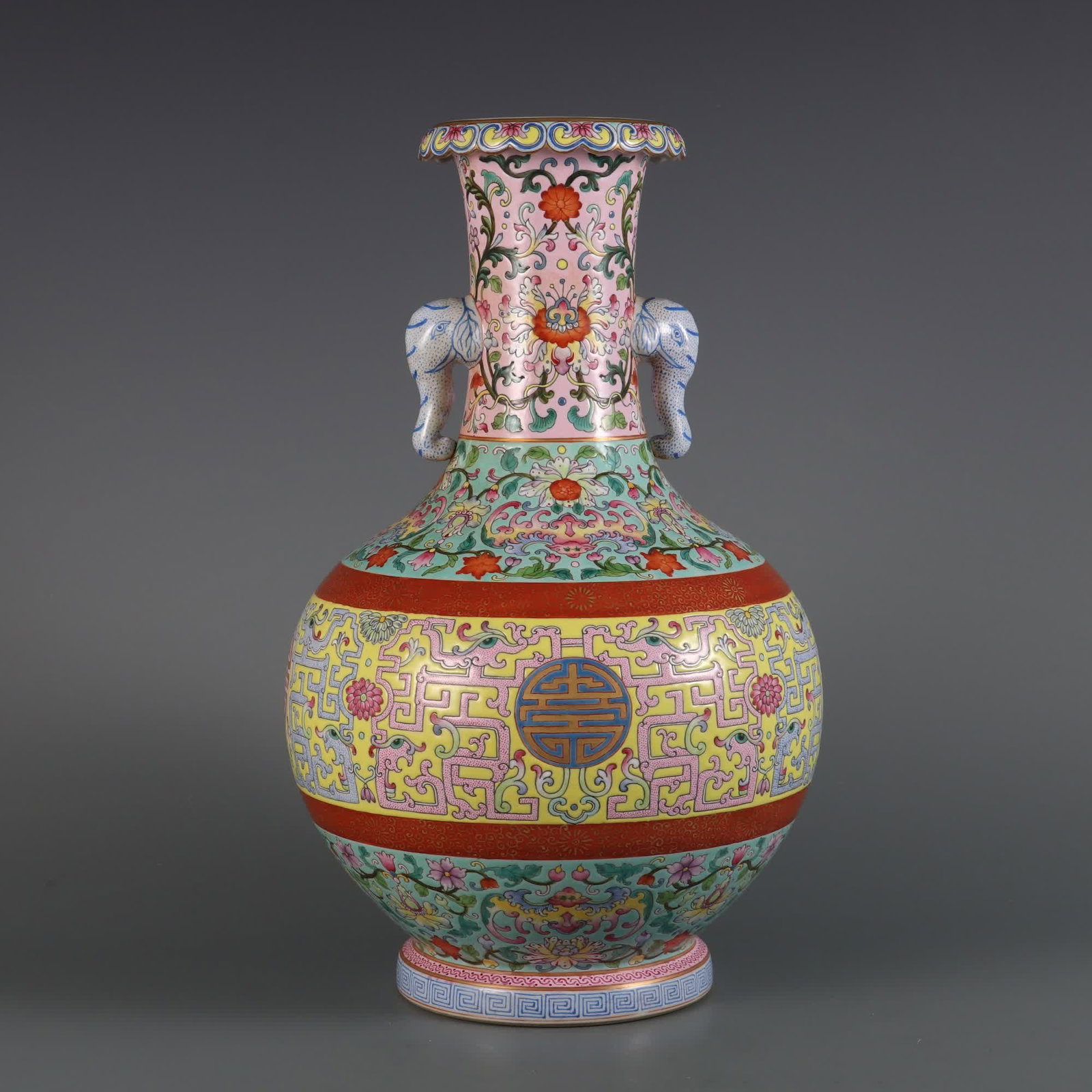A Qing Dynasty Qianlong year green pastel Kuifeng He Shou elephant ear vase: Qing Dynasty Qianlong year green pastel Kuifeng birthday elephant ear vase SIZE: H: 34.5cm Belly diameter 21cm MouthD: 9cm (The Dimensions Of All Batches Are Manually Measured.If You Need More Detaile