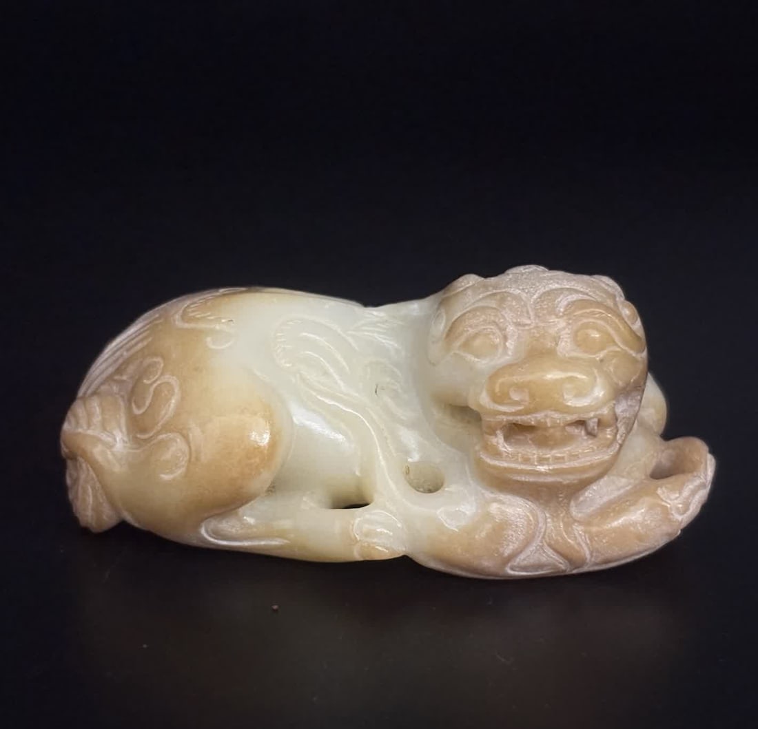 A Qing Dynasty jade beast (1 of 9)