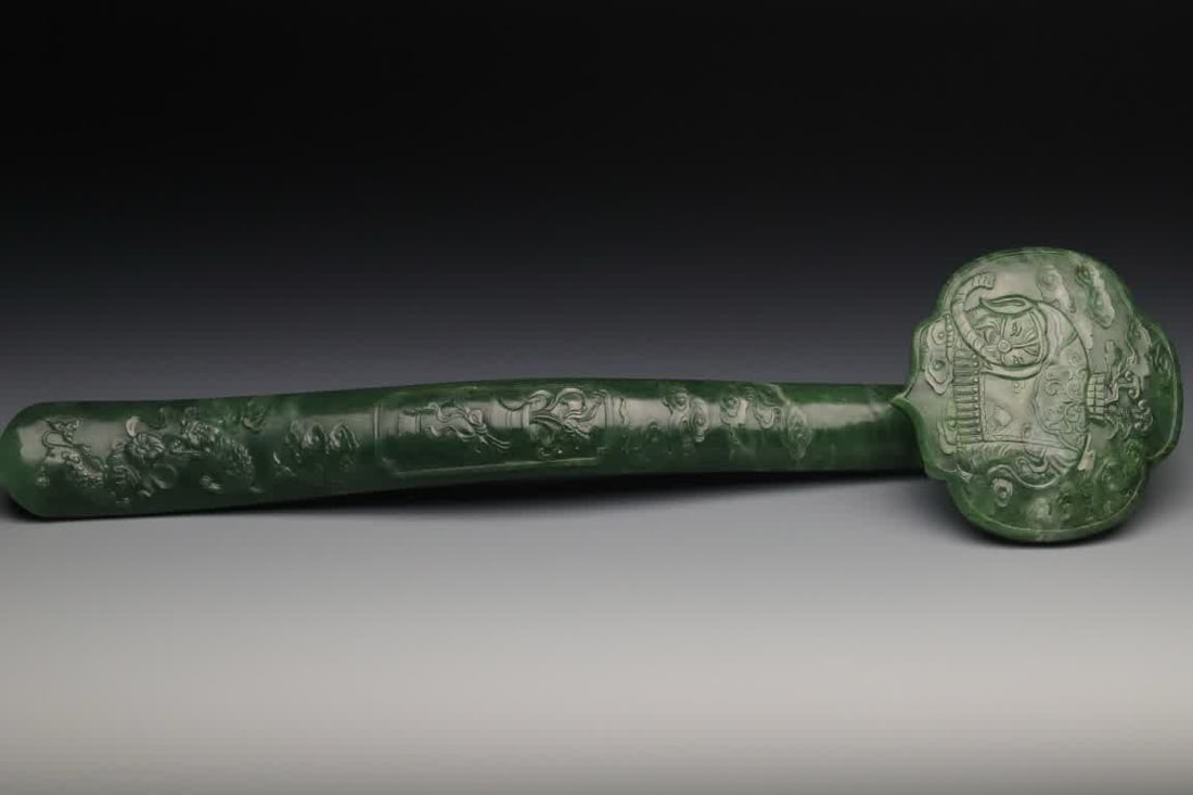A Qing Dynasty Taiping has an elephant jade ruyi ornament (1 of 9)