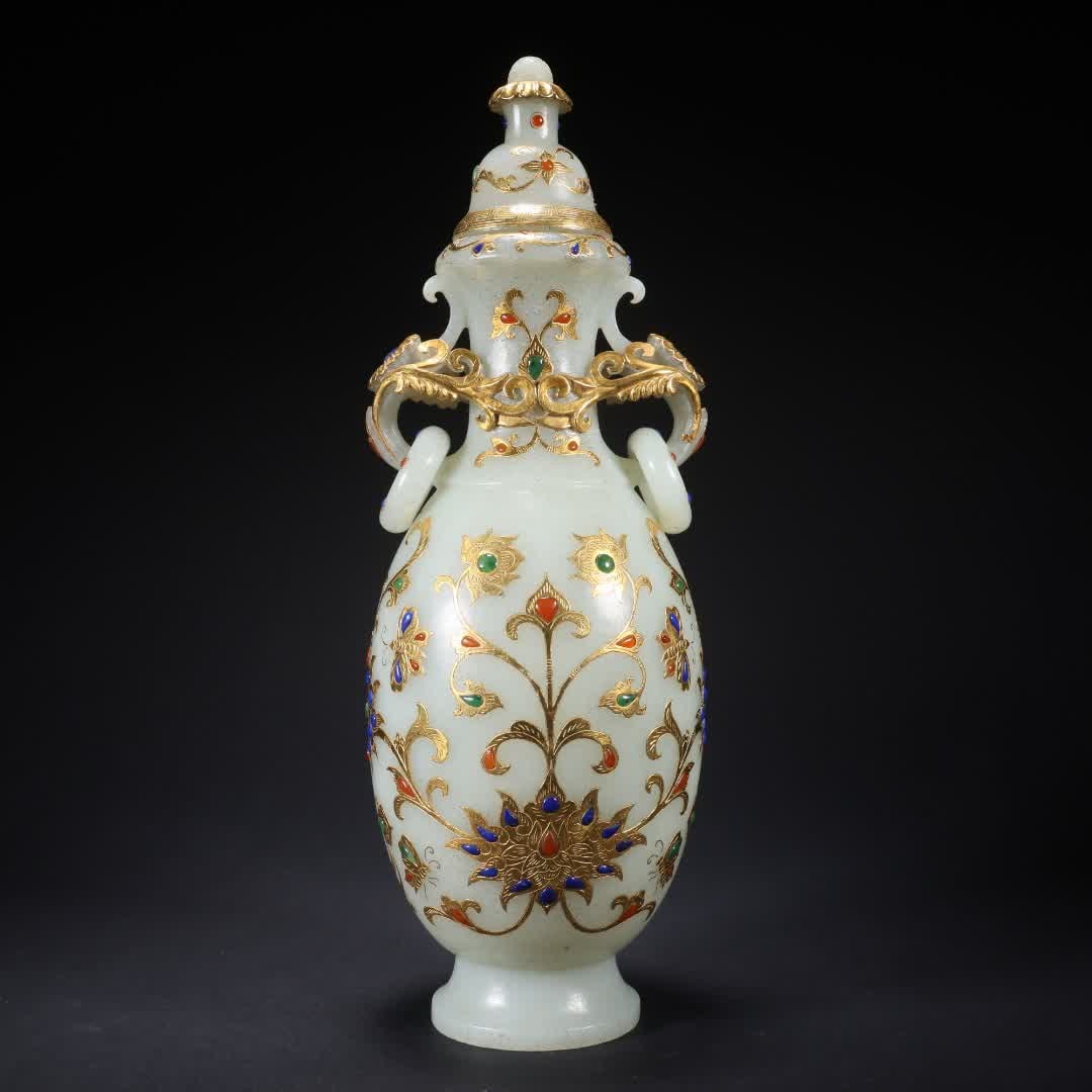 A Qing Dynasty Hetian Yucuo gold and silver inlaid treasure entwined bottle: Qing Dynasty Hetian Yucuo gold and silver inlaid treasure entwined pattern vase SIZE: L:8.5cm W:8.5cm H:24.2cm W:548g (The Dimensions Of All Batches Are Manually Measured.If You Need More Detailed Inf