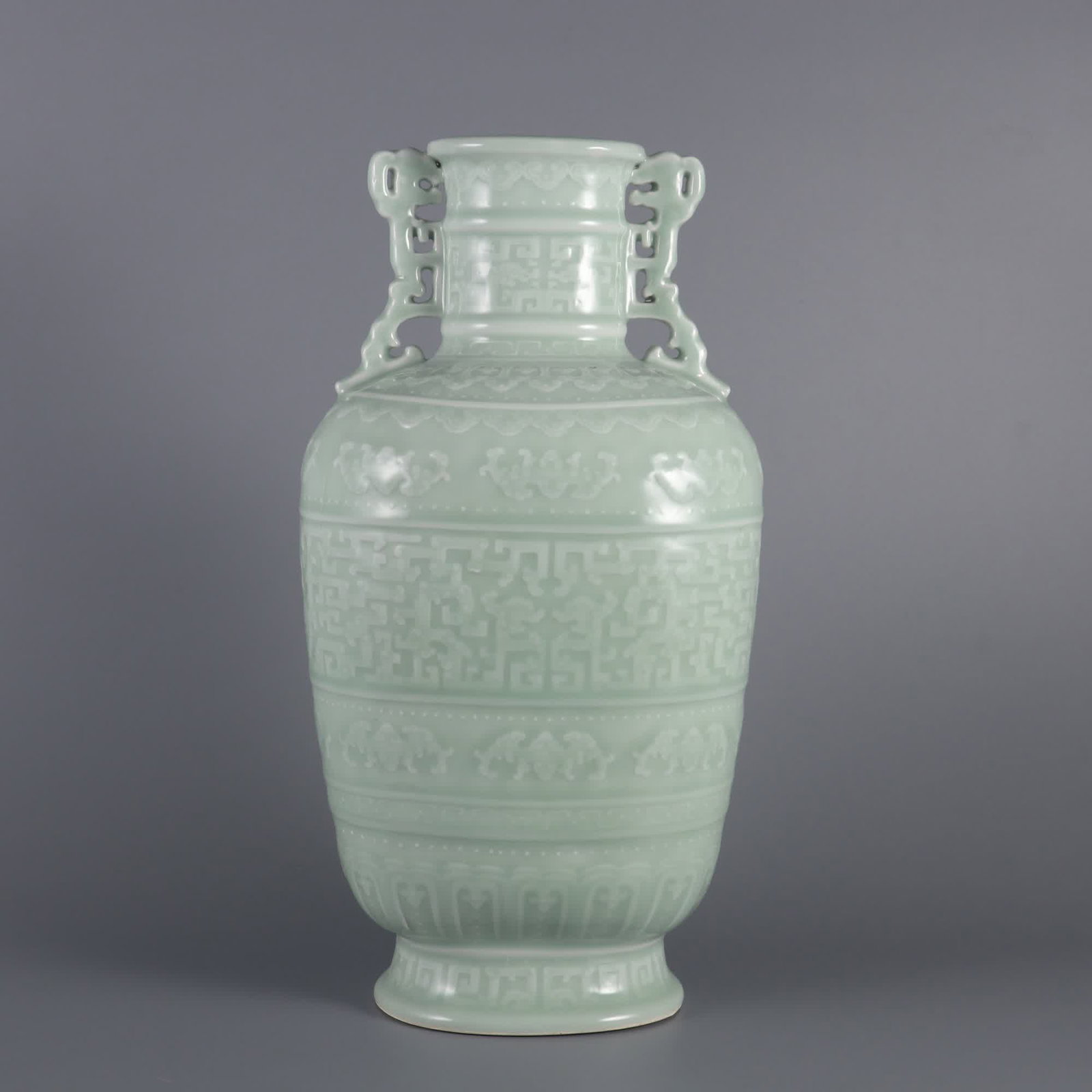 A Qing Dynasty Qianlong year bean celadon carved Kui dragon pattern amphora (1 of 9)