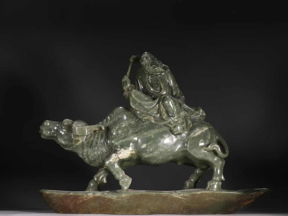 A Qing Dynasty Hetian jade "Lao Tzu Out of the Customs" portrait: Qing Dynasty Hetian jade "Lao Tzu out of the customs" portrait SIZE: H:31cm W:42cm W:9.7kg (The Dimensions Of All Batches Are Manually Measured.If You Need More Detailed Information, Please Contact Ou