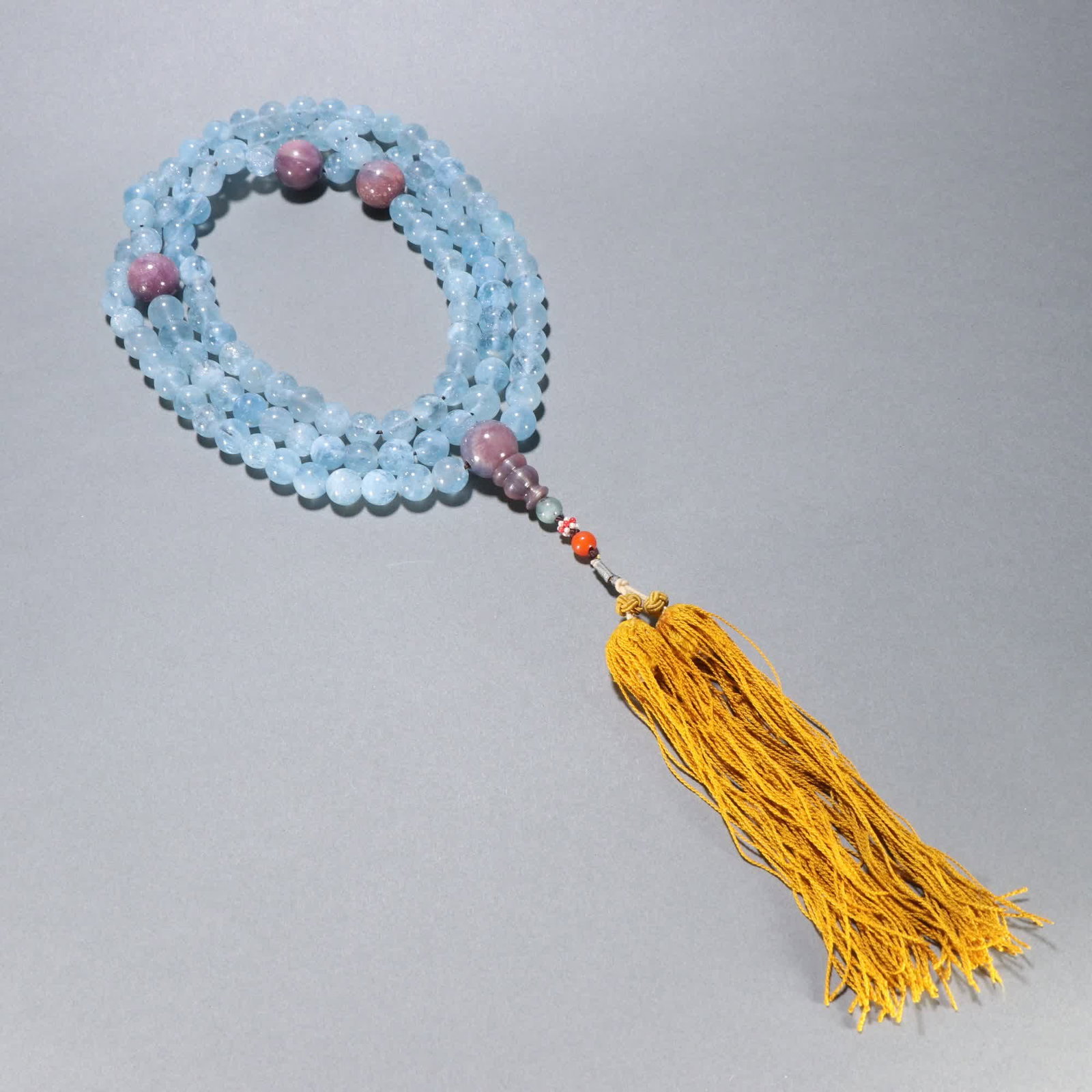 A Qing Dynasty aquamarine 108 Buddha bead (1 of 8)