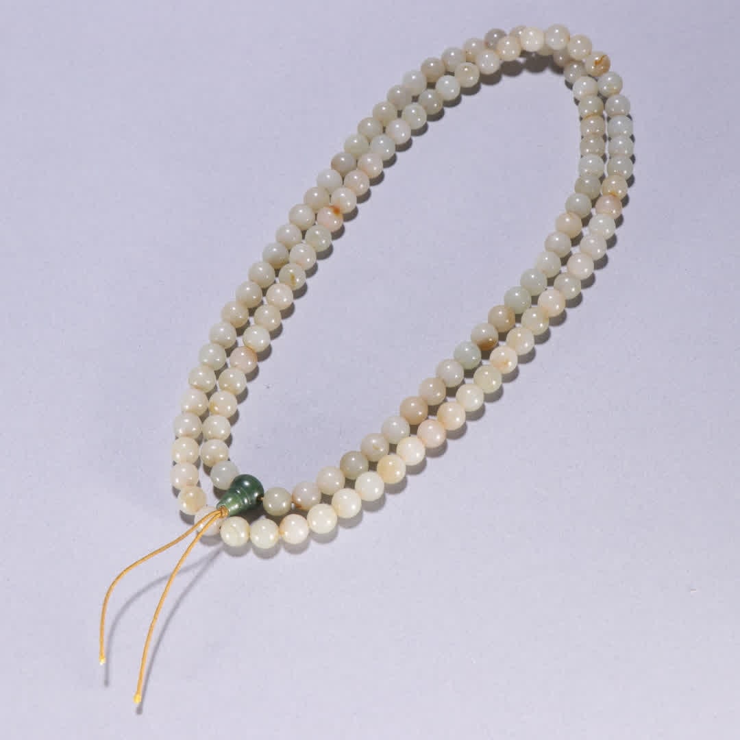 A piece of Qing Dynasty Hetian jade 108 Buddha beads: Qing Dynasty Hetian jade 108 Buddha beads SIZE: Bead diameter 0.8cm W: 89.1g (The Dimensions Of All Batches Are Manually Measured.If You Need More Detailed Information, Please Contact Our Customer Ser