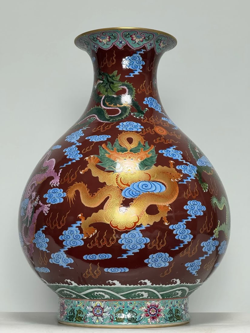 A Qing Dynasty Qianlong model enamel colorful turquoise green ground intertwined flowers purple: Qing Dynasty Qianlong model enamel colored turquoise green ground intertwined flowers purple ground Kowloon sea water cloud pattern jade pot spring vase SIZE: H:53cm W:40cm (The Dimensions Of All Batc