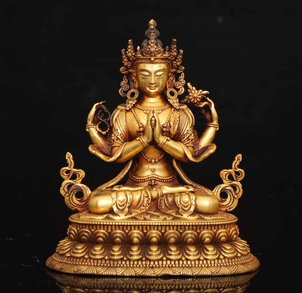 An Exquisite Gilt Bronze Four-arms Statue of Avalokitesvara Ornament: An Exquisite Gilt Bronze Four-arms Statue of Avalokitesvara Ornament Ming Dynasty, China Size:10cmx8.5cmx6cm Weight:481g (The Dimensions Of All Batches Are Manually Measured.If You Need More Detailed 
