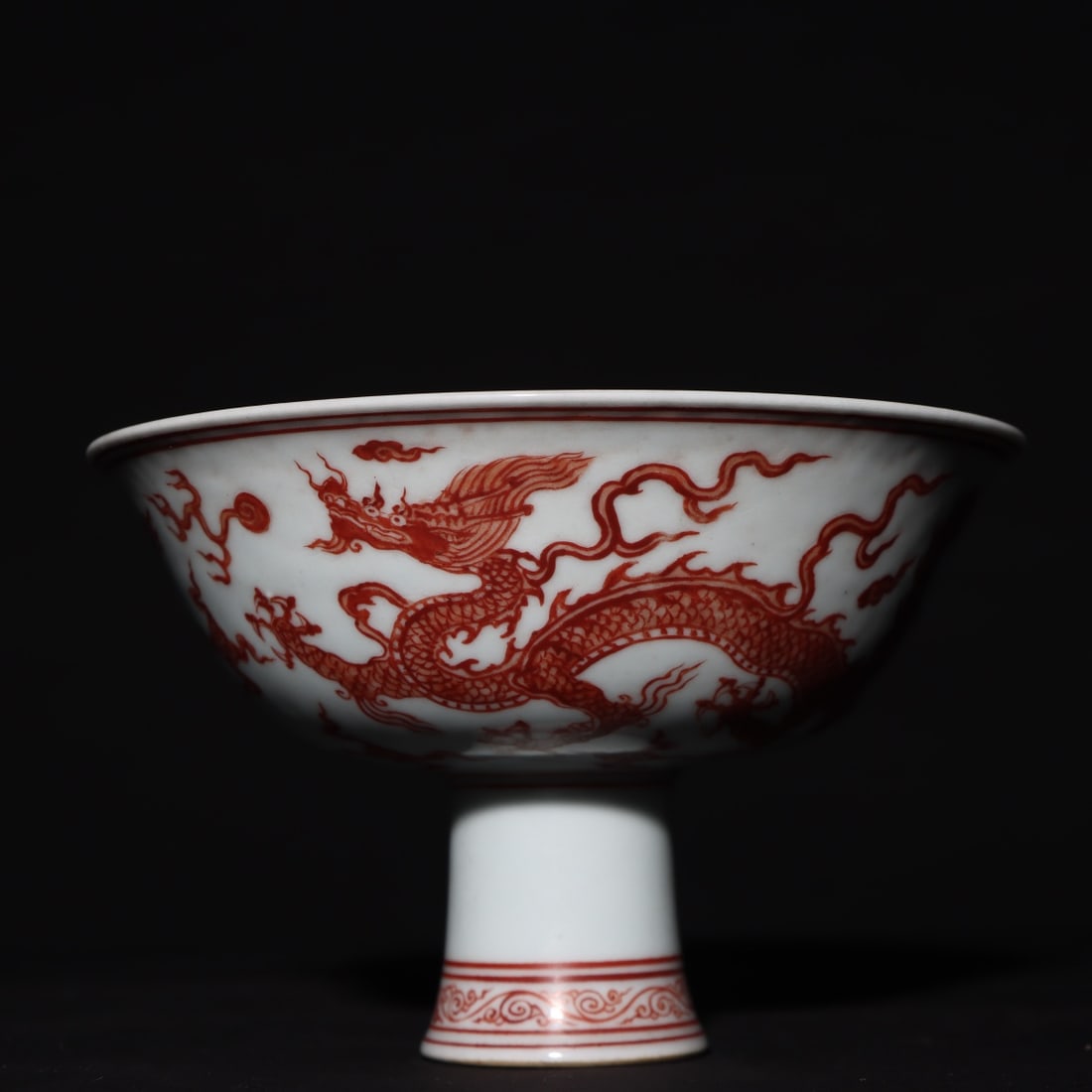 An Exquisite Iron-Red Dragon Pattern Stem Bowl: An Exquisite Iron-Red Dragon Pattern Stem Bowl Ming Dynasty, China Xuande Six-character Mark Size:10.3cmx16cm (The Dimensions Of All Batches Are Manually Measured.If You Need More Detailed Information