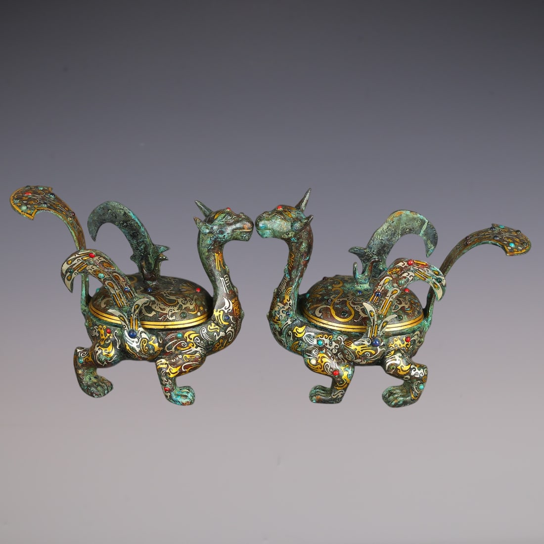 A Pair of Exquisite Bronze Inlaid Gold Inlaid Gems Auspicious Beast-Shaped Censer: A Pair of Exquisite Bronze Inlaid Gold Inlaid Gems Auspicious Beast-Shaped Censer Han Dynasty, China Size:26cmx12cmx18.5cm Weight:3610g (The Dimensions Of All Batches Are Manually Measured.If You Need