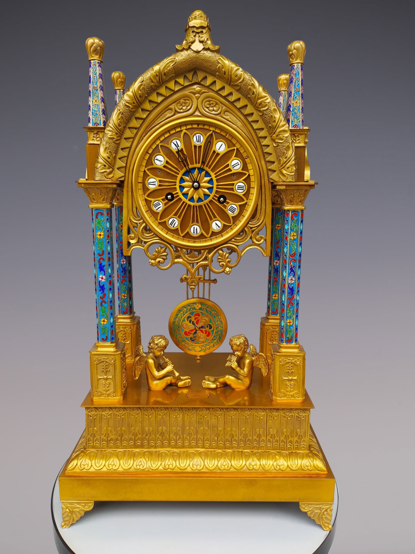 An Exquisite Gilt Bronze Lotus Pattern Clock: An Exquisite Gilt Bronze Lotus Pattern Clock Qing Dynasty, China Size:38cmx26cmx68cm (The Dimensions Of All Batches Are Manually Measured.If You Need More Detailed Information, Please Contact Our