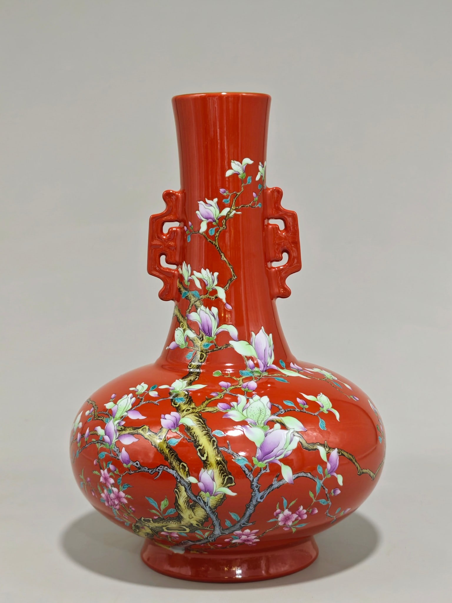 An Exquisite Famille-Rose Flower Pattern Double-Ears Vase: An Exquisite Famille-Rose Flower Pattern Double-Ears Vase Qing Dynasty, China Yongzheng Six-character Mark Size:32cmx23cm (The Dimensions Of All Batches Are Manually Measured.If You Need More Detailed