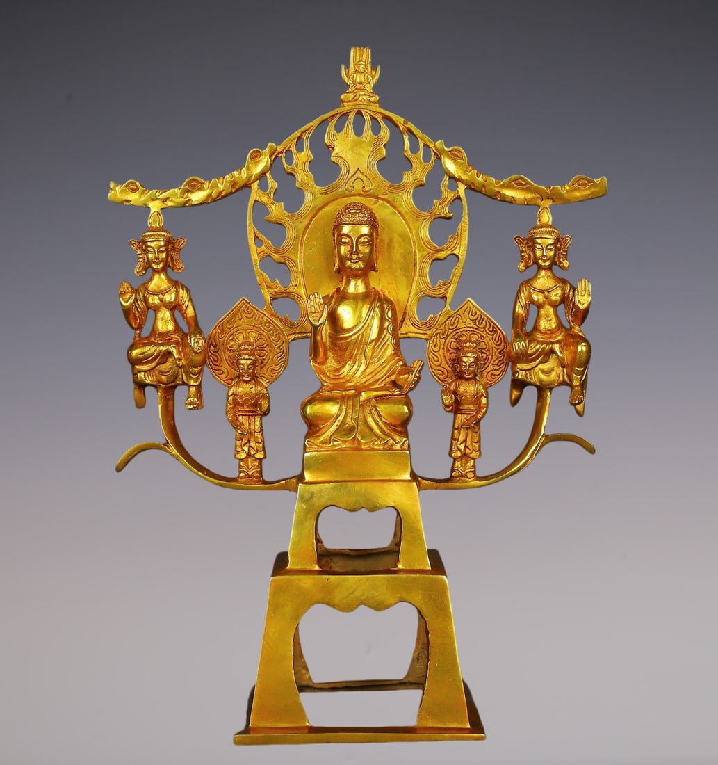 An Exquisite Gilt Bronze Buddha Statue: An Exquisite Gilt Bronze Buddha Statue N.Wei , China Size:27.5cmx37cm Weight:2450g (The Dimensions Of All Batches Are Manually Measured.If You Need More Detailed Information, Please Contact Our Custom