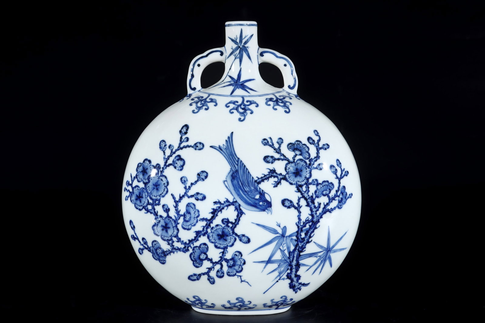 An Exquisite Blue and White Flower and Bird Pattern Double-Ears Vase: An Exquisite Blue and White Flower and Bird Pattern Double-Ears Vase Qing Dynasty, China Qianlong Six-character Mark Size:29.5cmx25cm (The Dimensions Of All Batches Are Manually Measured.If You Need M