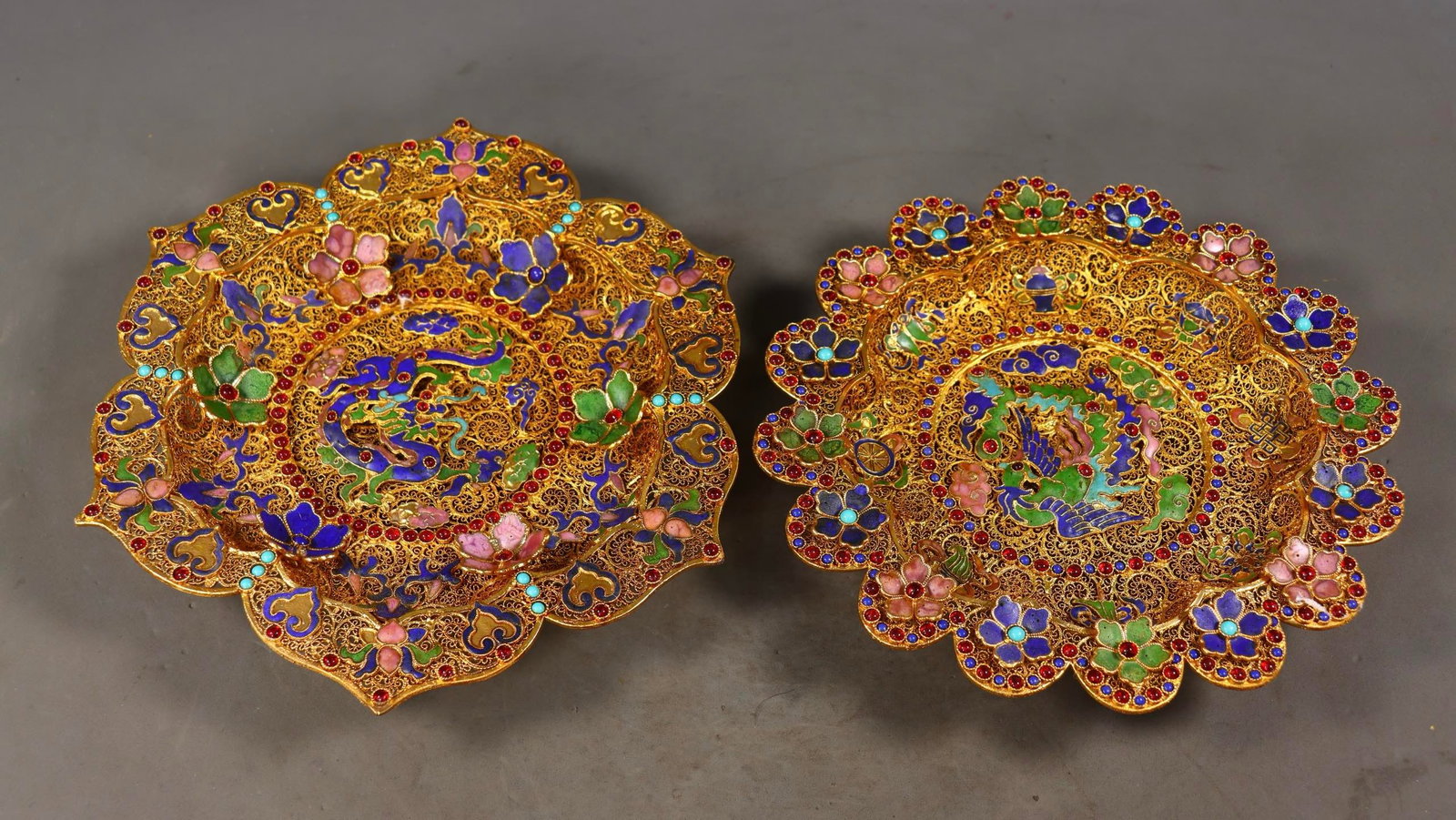 A Pair of Exquisite Gilt Bronze Inlaid Gems Dragon and Phoenix Pattern Plate: A Pair of Exquisite Gilt Bronze Inlaid Gems Dragon and Phoenix Pattern Plate Qing Dynasty, China Qianlong Four-character Mark Size:4cmx22cm Size:4cmx20cm Weight:915g (The Dimensions Of All Batches Are