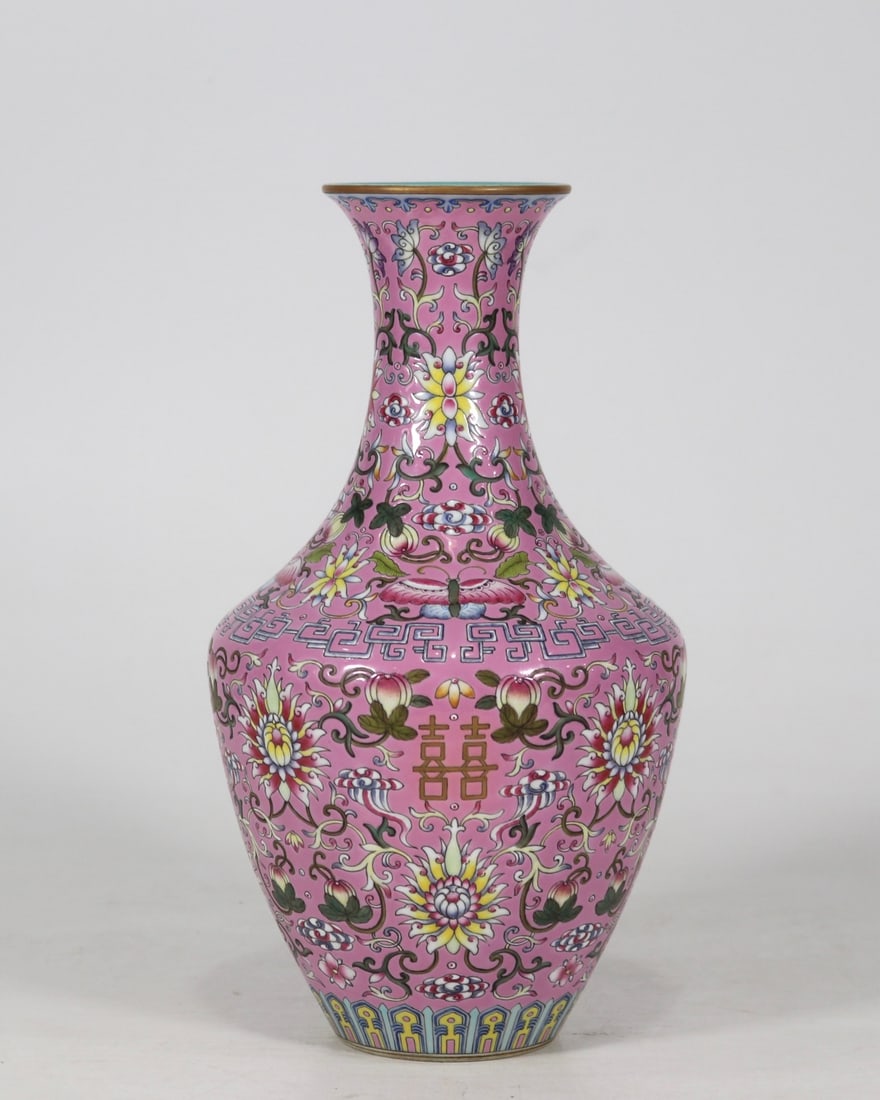 An Exquisite Famille-Rose Painted Gold Lotus Pattern Flower and Butterfly Pattern Vase: An Exquisite Famille-Rose Painted Gold Lotus Pattern Flower and Butterfly Pattern Vase Qing Dynasty, China Qianlong Six-character Mark Size:15.5cmx13.8cm (The Dimensions Of All Batches Are Manually Me