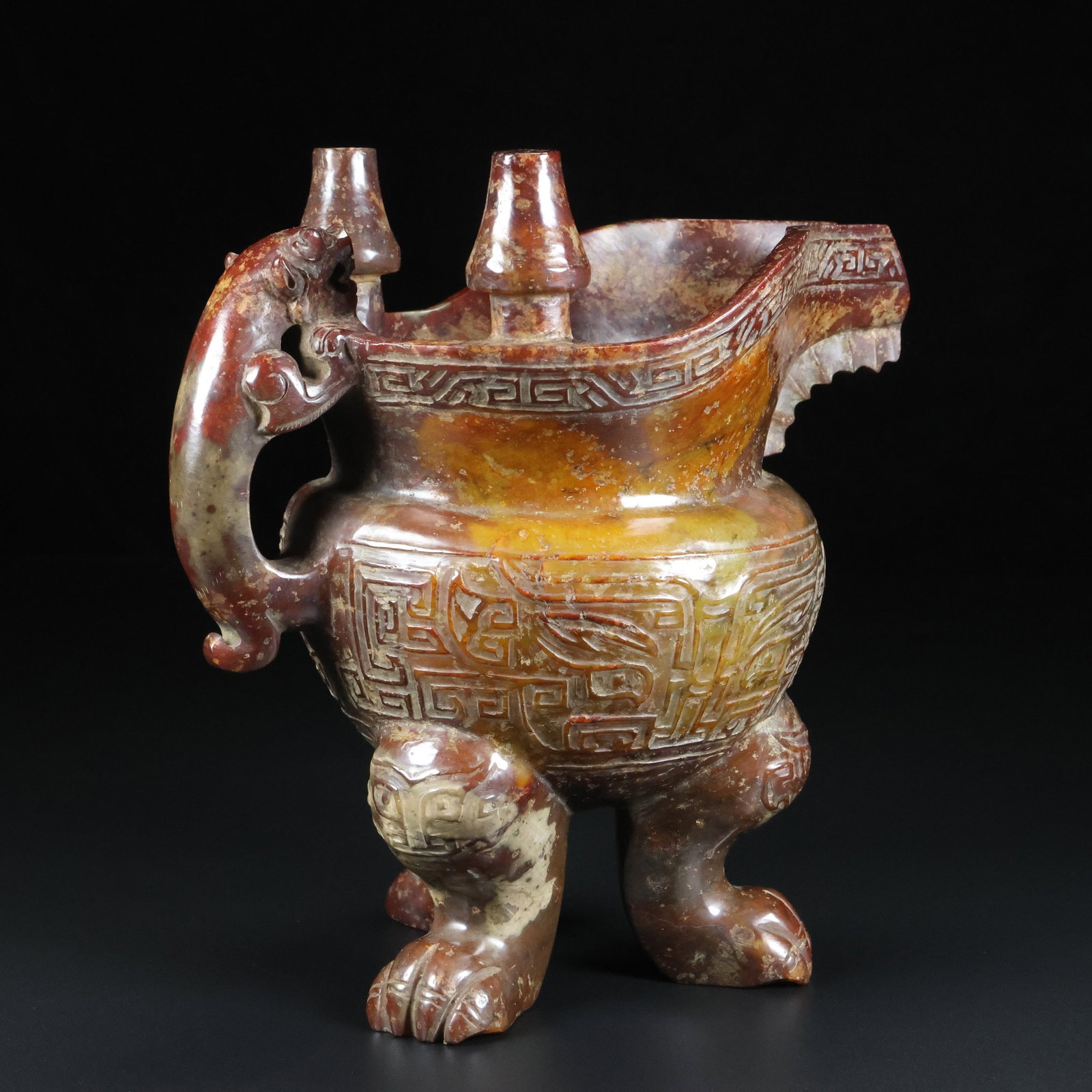 An Exquisite White Jade Beast-Face Pattern Tripod Cup: An Exquisite White Jade Beast-Face Pattern Tripod Cup S.Zhou , China Size:17.8cmx18.3cmx12cm Weight:1.75kg (The Dimensions Of All Batches Are Manually Measured.If You Need More Detailed Information, P