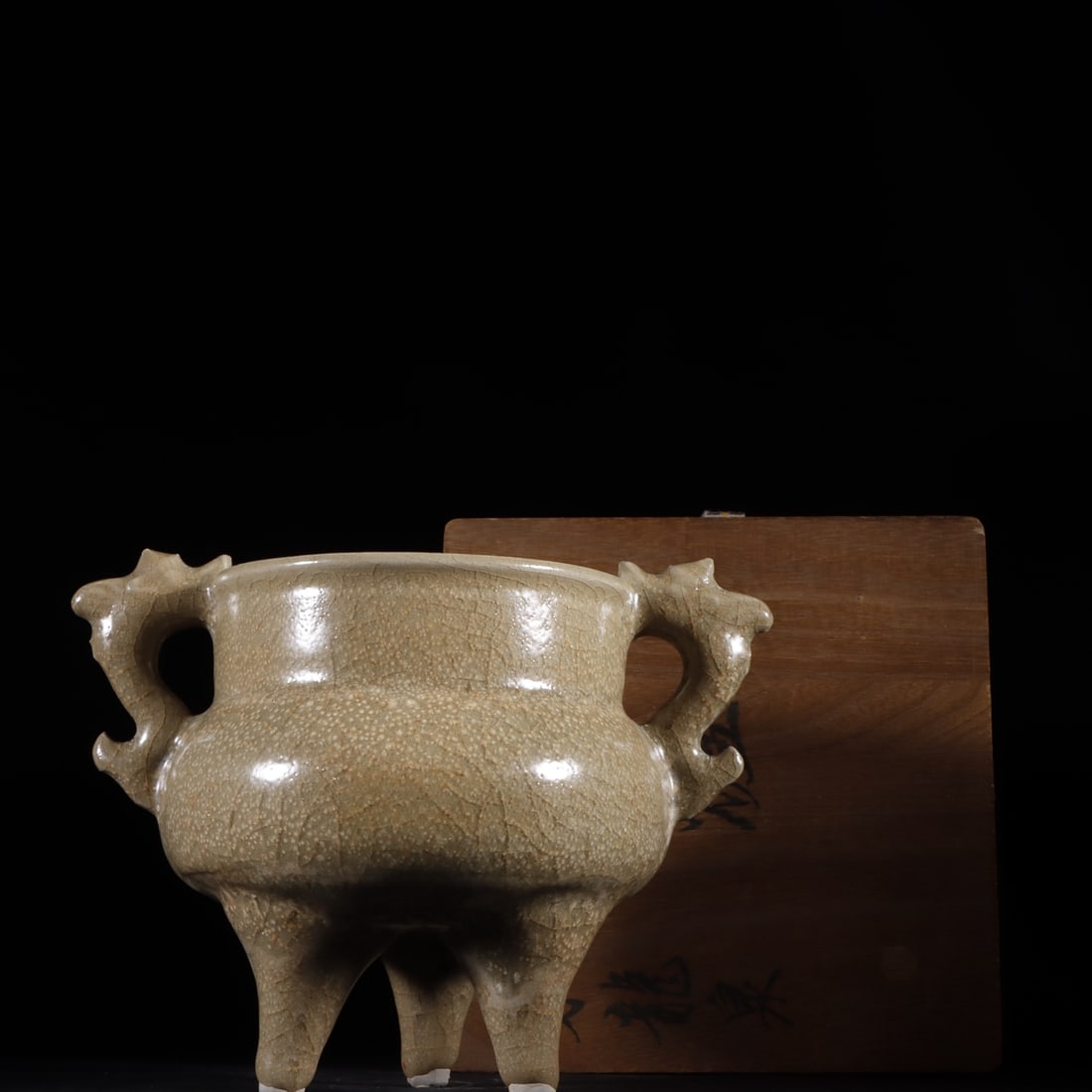 An Exquisite Longquan yao Double-Ears and Tripod Censer: An Exquisite Longquan yao Double-Ears and Tripod Censer Song Dynasty, China Size:13.5cmx9.9cm (The Dimensions Of All Batches Are Manually Measured.If You Need More Detailed Information, Please Contact
