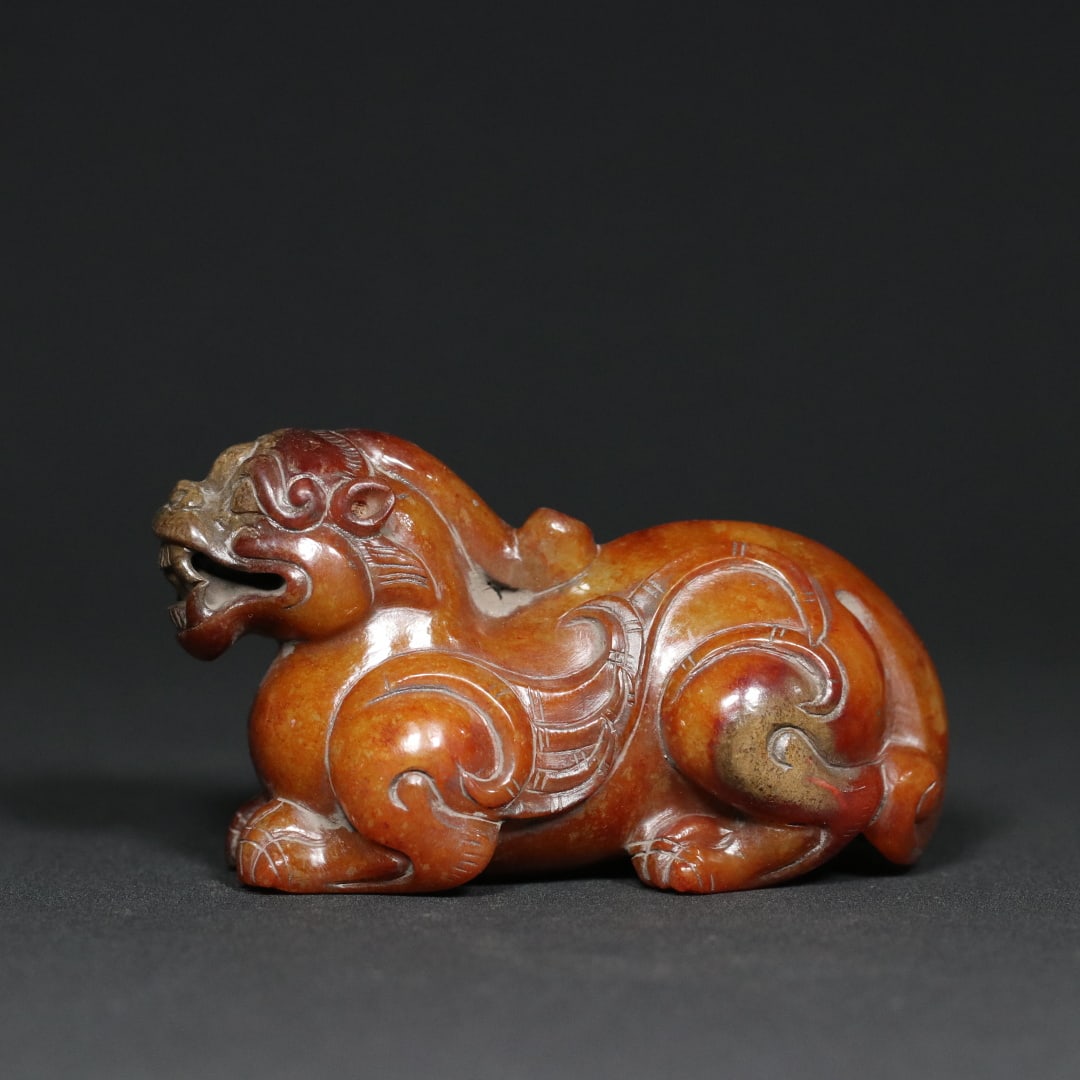 An Exquisite White Jade Auspicious Beast Ornament (1 of 9)