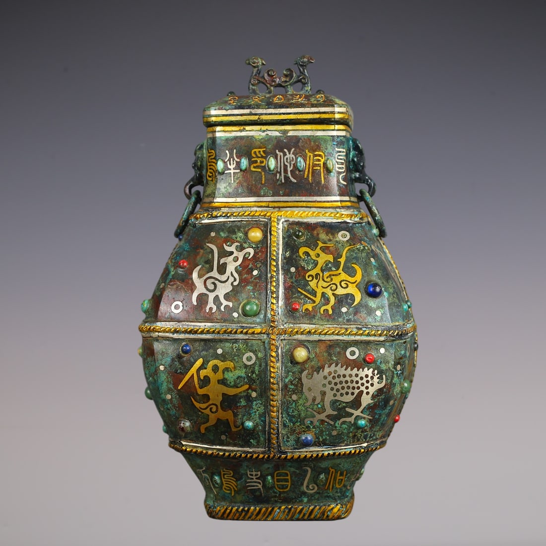 An Exquisite Bronze Inlaid Gold Inlaid Gems With Inscription Double-Ears Vase: An Exquisite Bronze Inlaid Gold Inlaid Gems With Inscription Double-Ears Vase Han Dynasty, China Size:15cmx27cm Weight:1880g (The Dimensions Of All Batches Are Manually Measured.If You Need More Detai