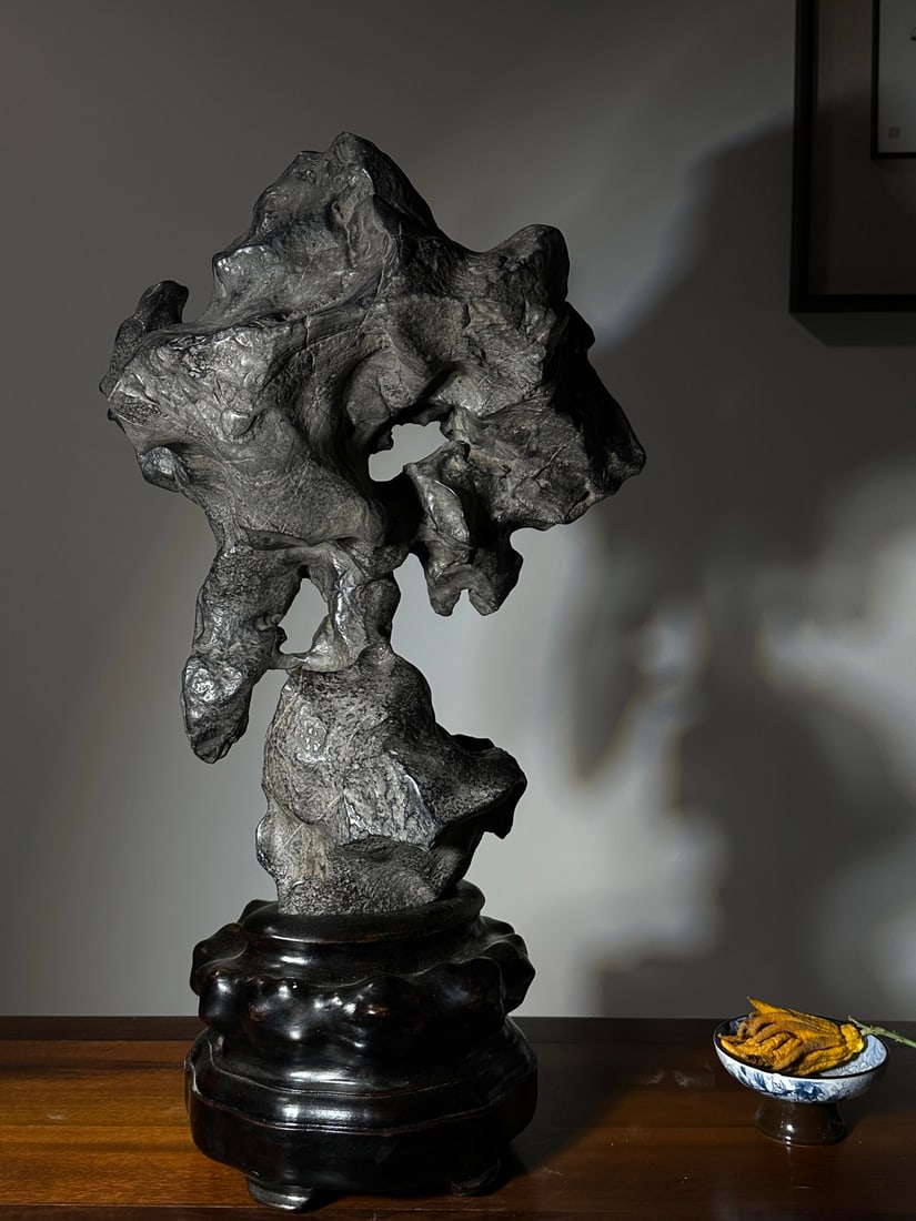 An Exquisite Lingbi Stone Ornament: An Exquisite Lingbi Stone Ornament Qing Dynasty, China Size:71cmx40cmx24cm (The Dimensions Of All Batches Are Manually Measured.If You Need More Detailed Information, Please Contact Our Customer