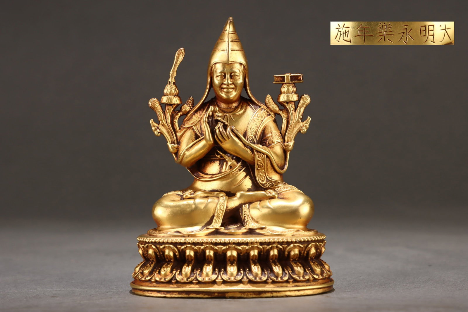 An Exquisite Gilt Bronze Statue of Tsongkhapa: An Exquisite Gilt Bronze Statue of Tsongkhapa Ming Dynasty, China Yongle Six-character Mark Size:12cmx8.5cm Weight:1150g (The Dimensions Of All Batches Are Manually Measured.If You Need More Detailed 