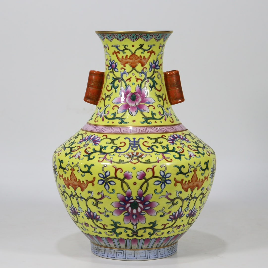 An Exquisite Famille-Rose Bats and Peach Pattern Lotus Pattern Double-Ears Vase: An Exquisite Famille-Rose Bats and Peach Pattern Lotus Pattern Double-Ears Vase Qing Dynasty, China Qianlong Six-character Mark Size:31cmx21cm (The Dimensions Of All Batches Are Manually Measured.If Y