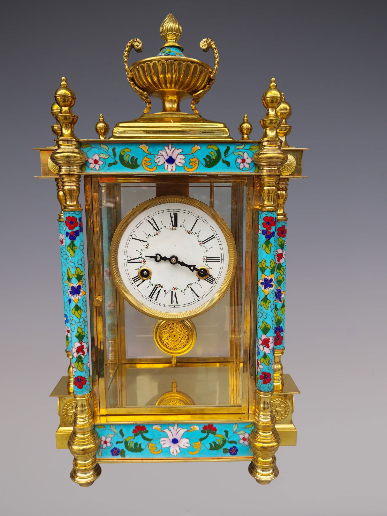 An Exquisite Gilt Bronze Lotus Pattern Clock: An Exquisite Gilt Bronze Lotus Pattern Clock Qing Dynasty, China Size:33cmx20cmx55cm (The Dimensions Of All Batches Are Manually Measured.If You Need More Detailed Information, Please Contact Our Cust