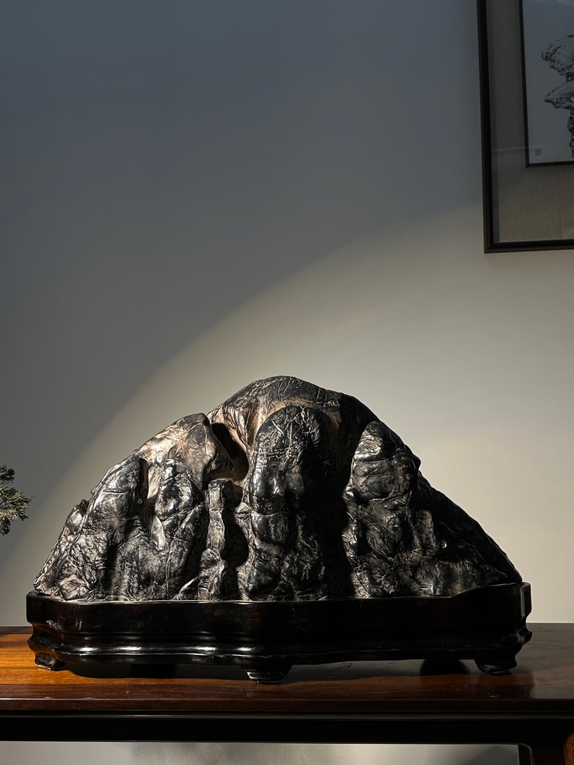 An Exquisite Lingbi Stone Ornament: An Exquisite Lingbi Stone Ornament Qing Dynasty, China Size:70cmx41cmx22cm (The Dimensions Of All Batches Are Manually Measured.If You Need More Detailed Information, Please Contact Our Customer Servi