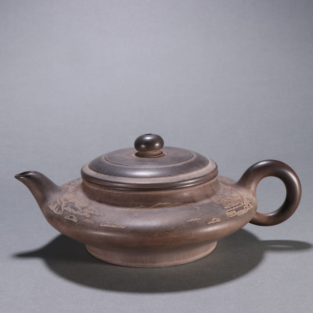 An Exquisite Purple Sands Landscape Pattern Teapot: An Exquisite Purple Sands Landscape Pattern Teapot Qing Dynasty, China Size:8.5cmx20cm (The Dimensions Of All Batches Are Manually Measured.If You Need More Detailed Information, Please Contact Our