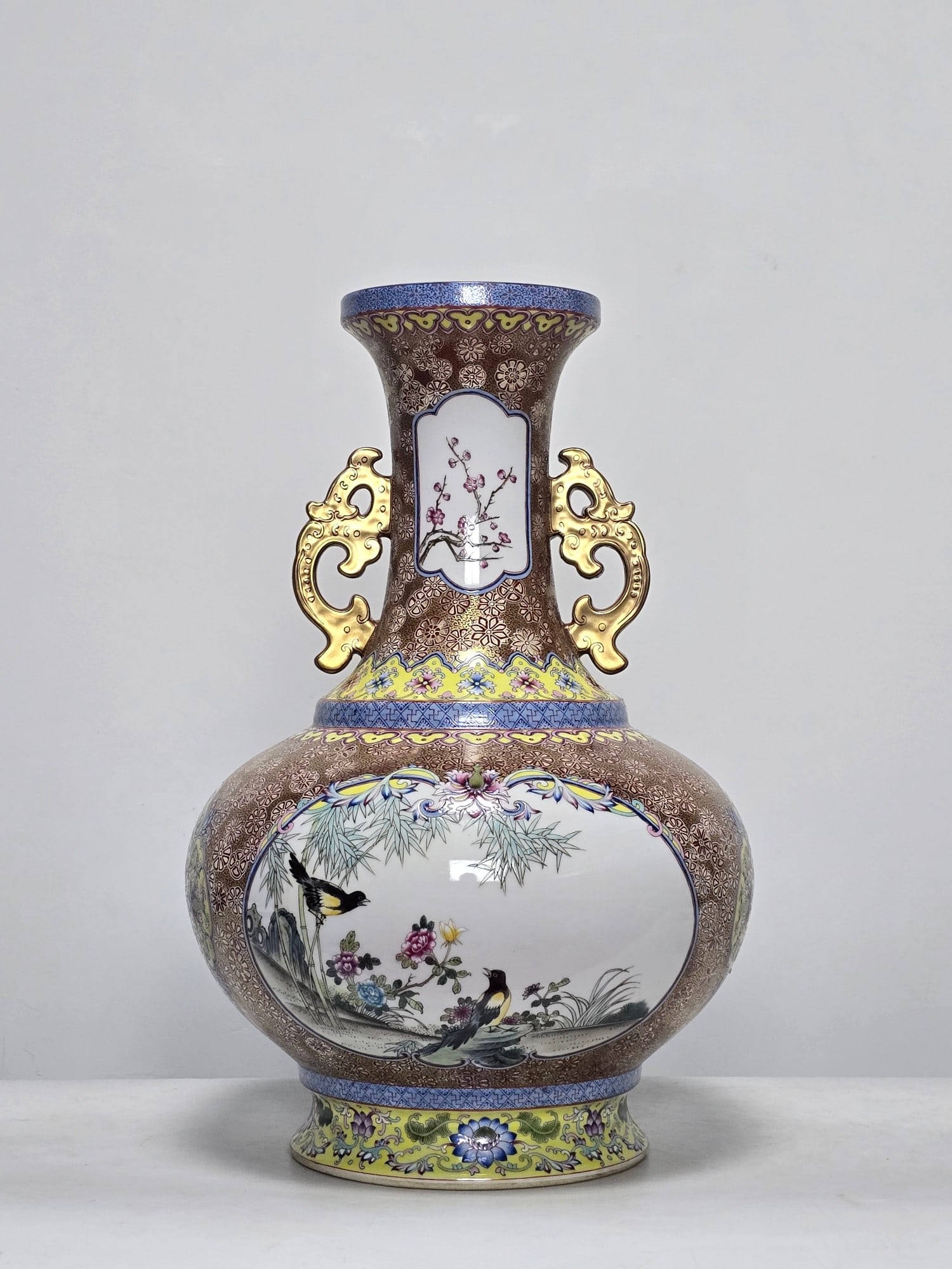An Exquisite Enamel Painted Gold Lotus Pattern Flower and Bird Pattern Double-Ears Vase: An Exquisite Enamel Painted Gold Lotus Pattern Flower and Bird Pattern Double-Ears Vase Qing Dynasty, China Qianlong Six-character Mark Size:48cmx32cm (The Dimensions Of All Batches Are Manually