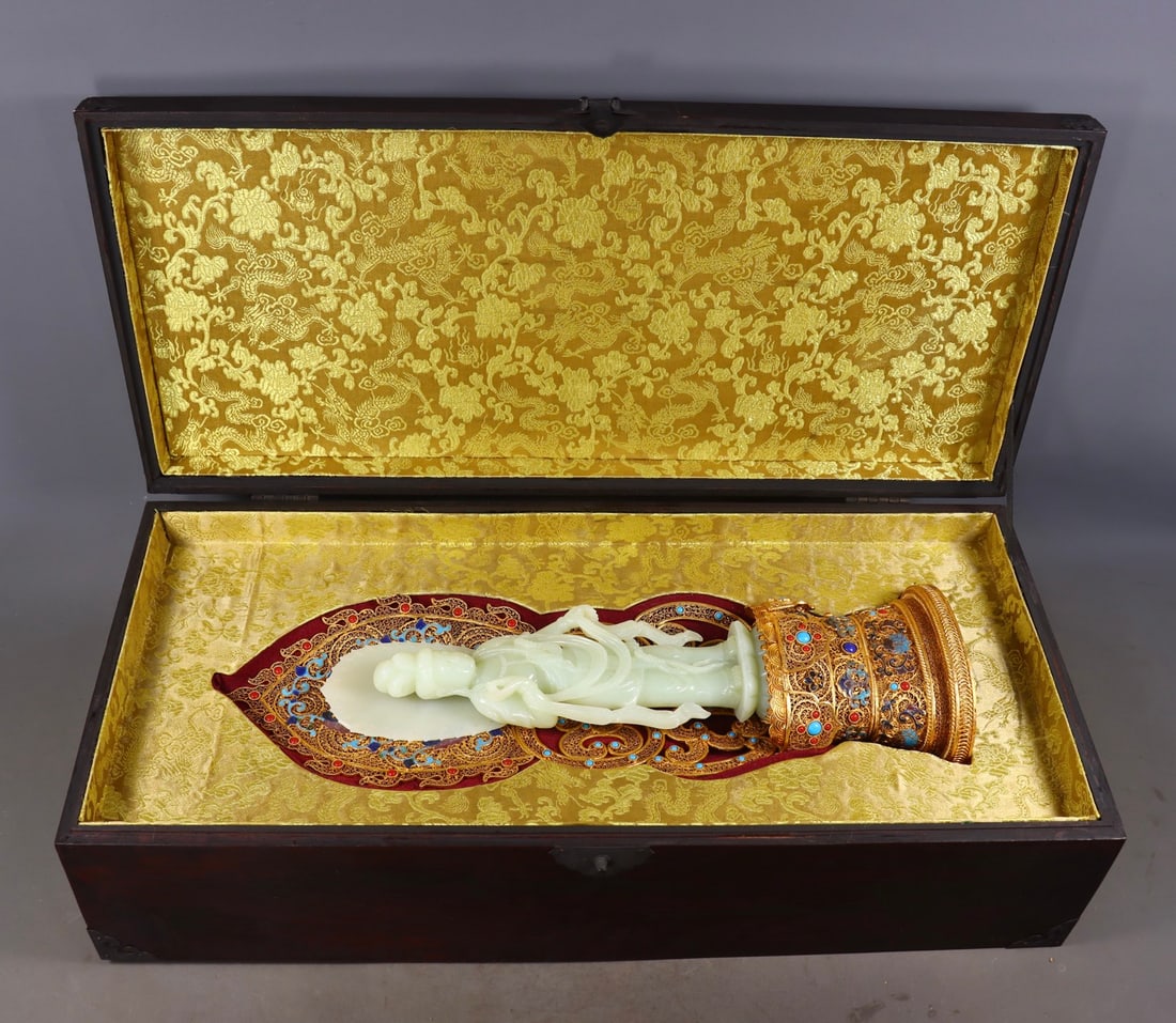 An Exquisite Gilt Bronze Inlaid White Jade Buddha Statue: An Exquisite Gilt Bronze Inlaid White Jade Buddha Statue Qing Dynasty, China Qianlong Four-character Mark Size:43cmx13cmx8.5cm Weight:1408g (The Dimensions Of All Batches Are Manually Measured.If You