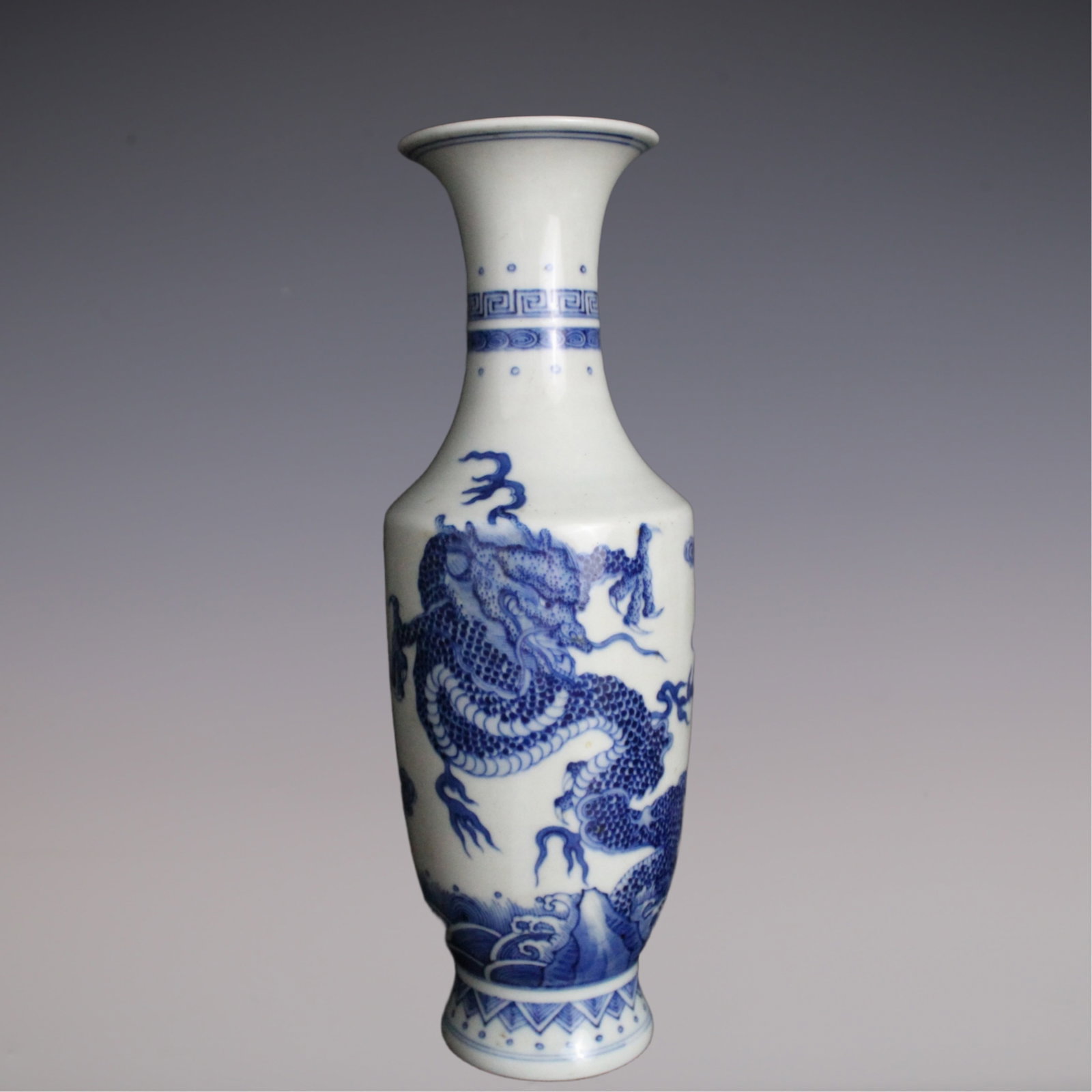 An Exquisite Blue and White Dragon Pattern Tiger Pattern Seawater Pattern Vase: An Exquisite Blue and White Dragon Pattern Tiger Pattern Seawater Pattern Vase Qing Dynasty, China Kangxi Six-character Mark Size:28cmx6.5cm (The Dimensions Of All Batches Are Manually Measured.If