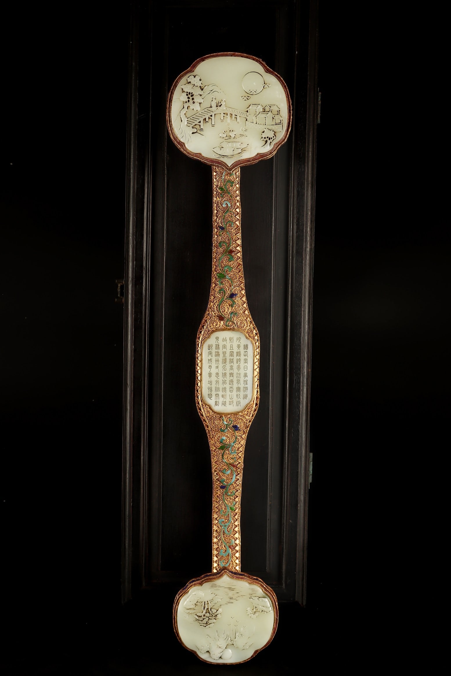 An Exquisite Gilt Bronze Inlaid White Jade Landscape Pattern Lotus Pattern with poem Ruyi: An Exquisite Gilt Bronze Inlaid White Jade Landscape Pattern Lotus Pattern with poem Ruyi Qing Dynasty, China Qianlong Four-character Mark Size:65.5cmx13cmx9.5cm Weight:2897g (The Dimensions Of All