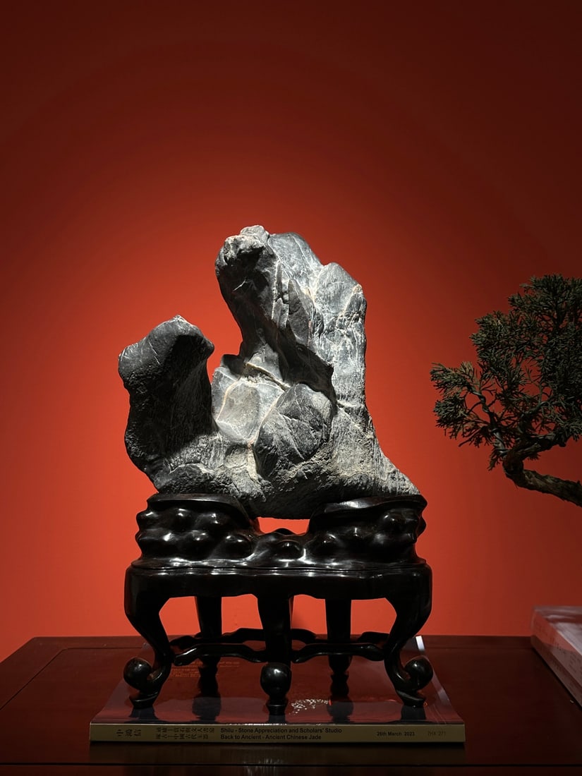 An Exquisite Lingbi Stone Ornament: An Exquisite Lingbi Stone Ornament Qing Dynasty, China Size:42cmx26cmx16cm (The Dimensions Of All Batches Are Manually Measured.If You Need More Detailed Information, Please Contact Our Customer