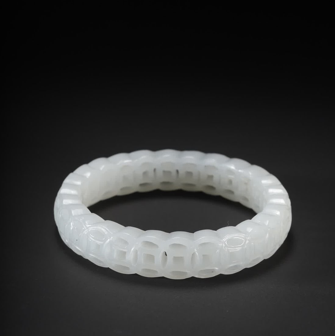 A Qing Dynasty Hetian jade family wealth bracelet: Qing Dynasty Hetian Yu family wealth bracelet SIZE: Inner diameter 5.6cm W:1.2cm W:31.6g (The Dimensions Of All Batches Are Manually Measured.If You Need More Detailed Information, Please Contact Our