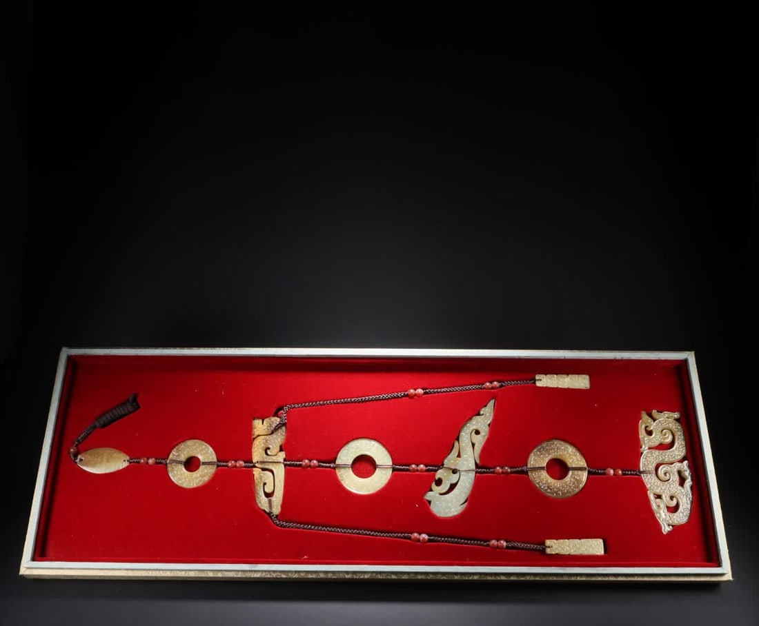 An ancient jade pendant: A set of nine pieces of ancient jade pendants SIZE: One piece L: 12cm W: 4.6cm T: 0.5cm Total W: 245g (The Dimensions Of All Batches Are Manually Measured.If You Need More Detailed Information, Please