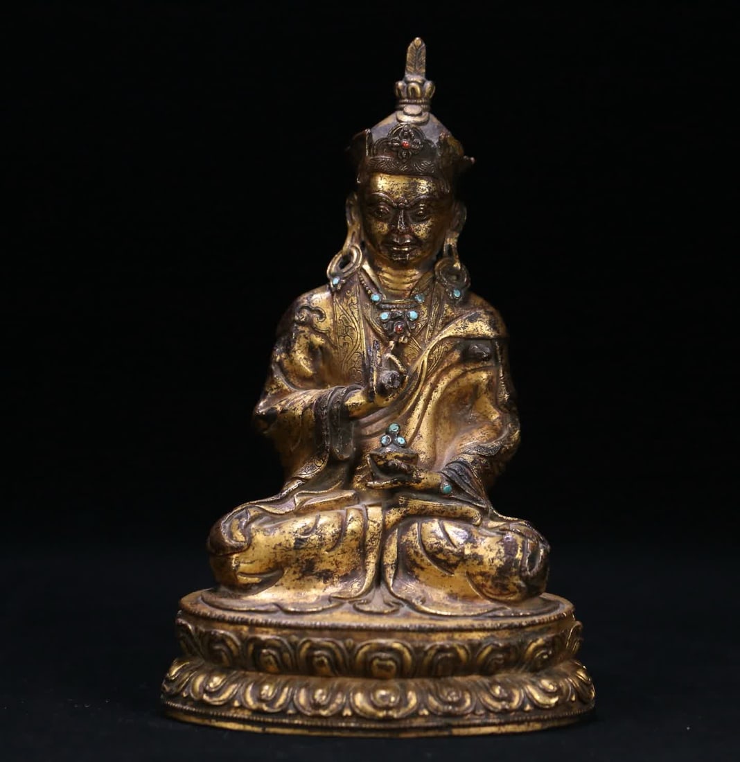 A 16th-century Tibetan Buddhist bronze gilt statue of Master Peanut (1 of 10)