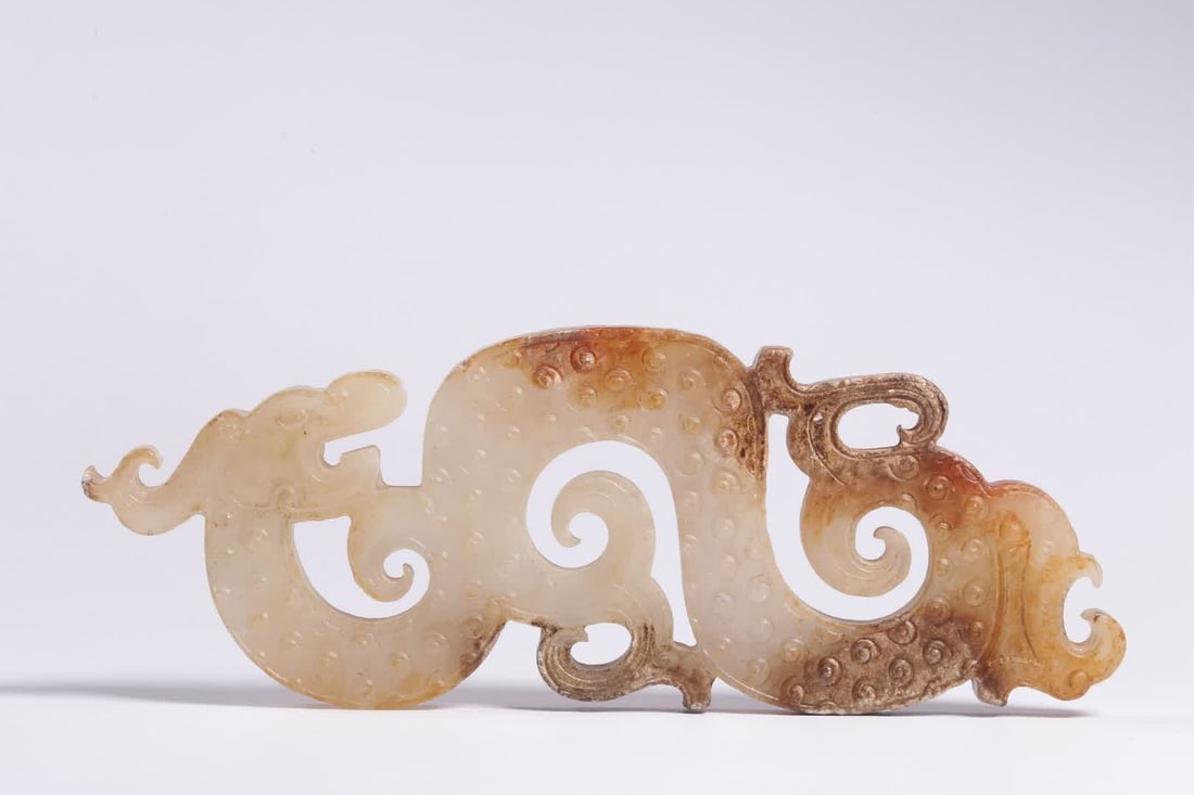 A Han Dynasty Hetian white jade belt with a dragon pendant (1 of 6)