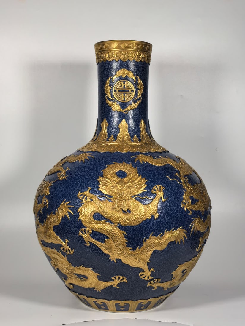 A Qing Dynasty Qianlong enamel carved Kowloon gold-painted celestial ball vase (1 of 9)