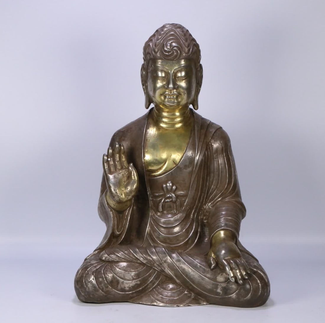 A Ming Dynasty silver Buddha sterling silver partially gilt statue of Shakyamuni (1 of 9)