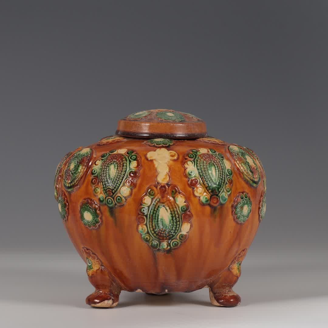 A Tang Sancai pinch plastic appliqu?? three-legged lid jar (1 of 9)