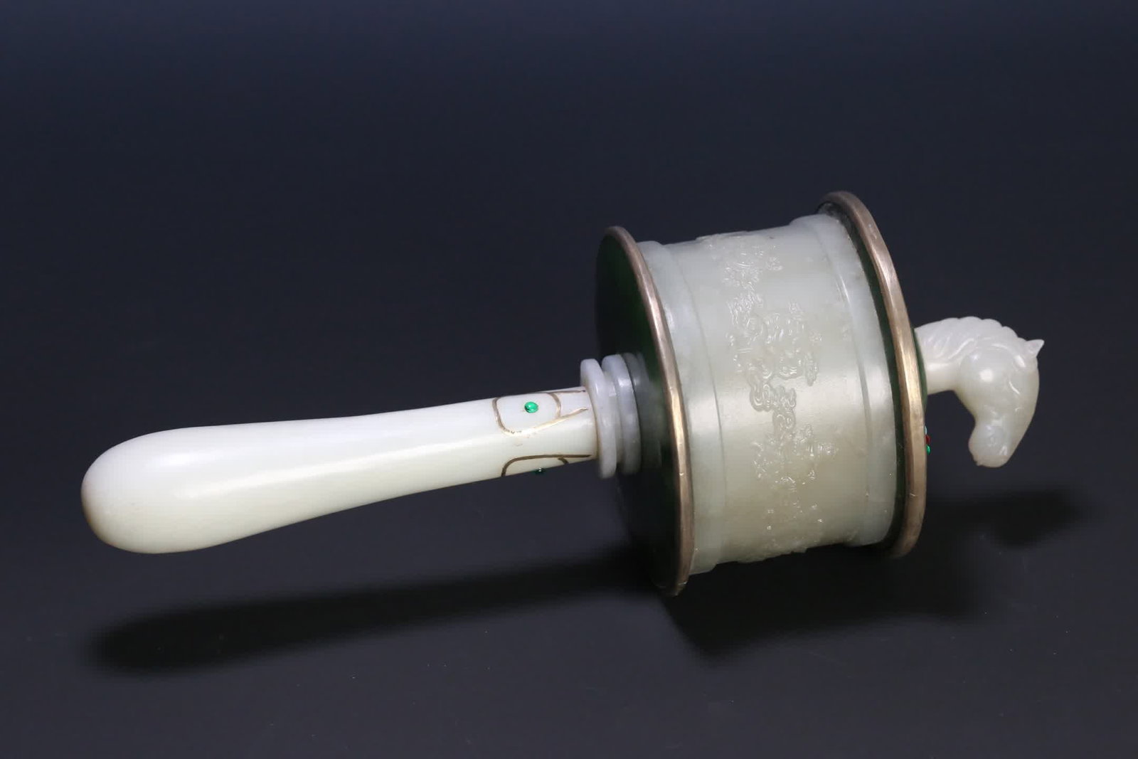 A Qing Dynasty Tibetan Hetian jade bag silver edge cuo silver silk horse head eight treasure pattern: Qing Dynasty Tibetan Hetian jade bag silver edge cuo silver silk horse head eight treasure pattern prayer wheel SIZE: 22.3x8.6cm W:673g (The Dimensions Of All Batches Are Manually Measured.If You Need