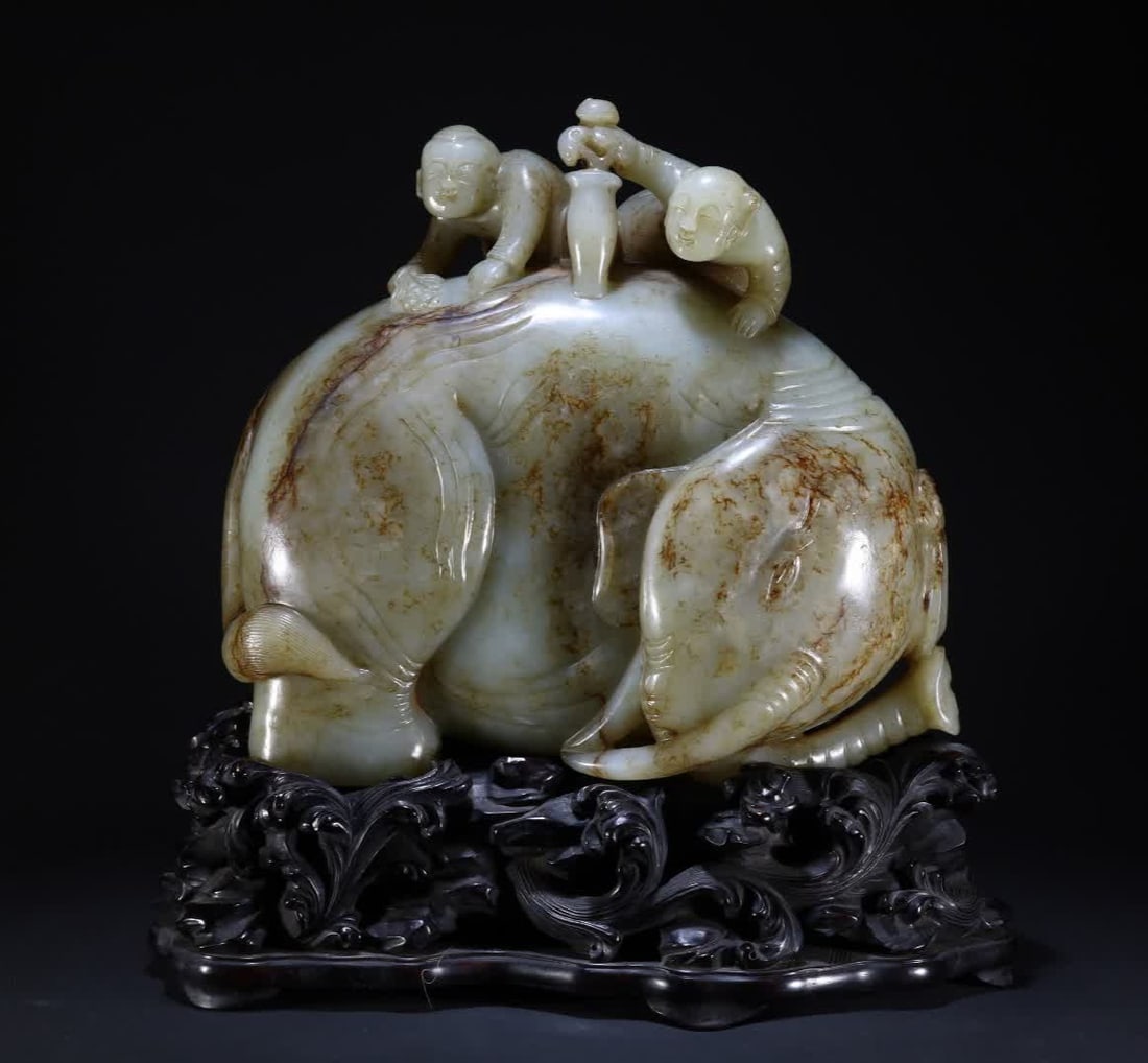 A Qing Dynasty Hetian jade boy ornament (1 of 11)