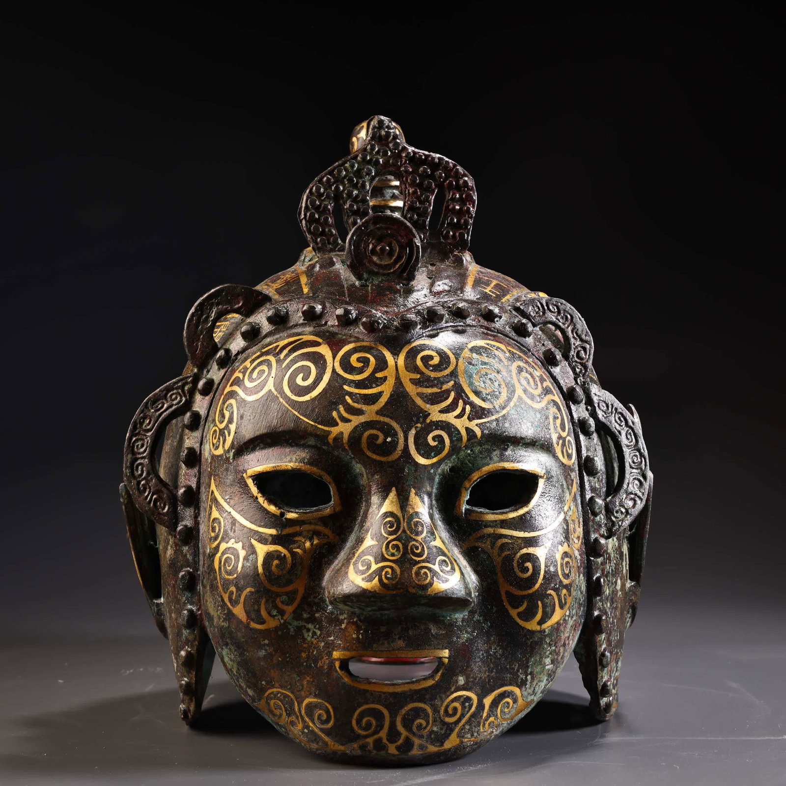 A Han bronze Cuojin mask helmet (1 of 9)